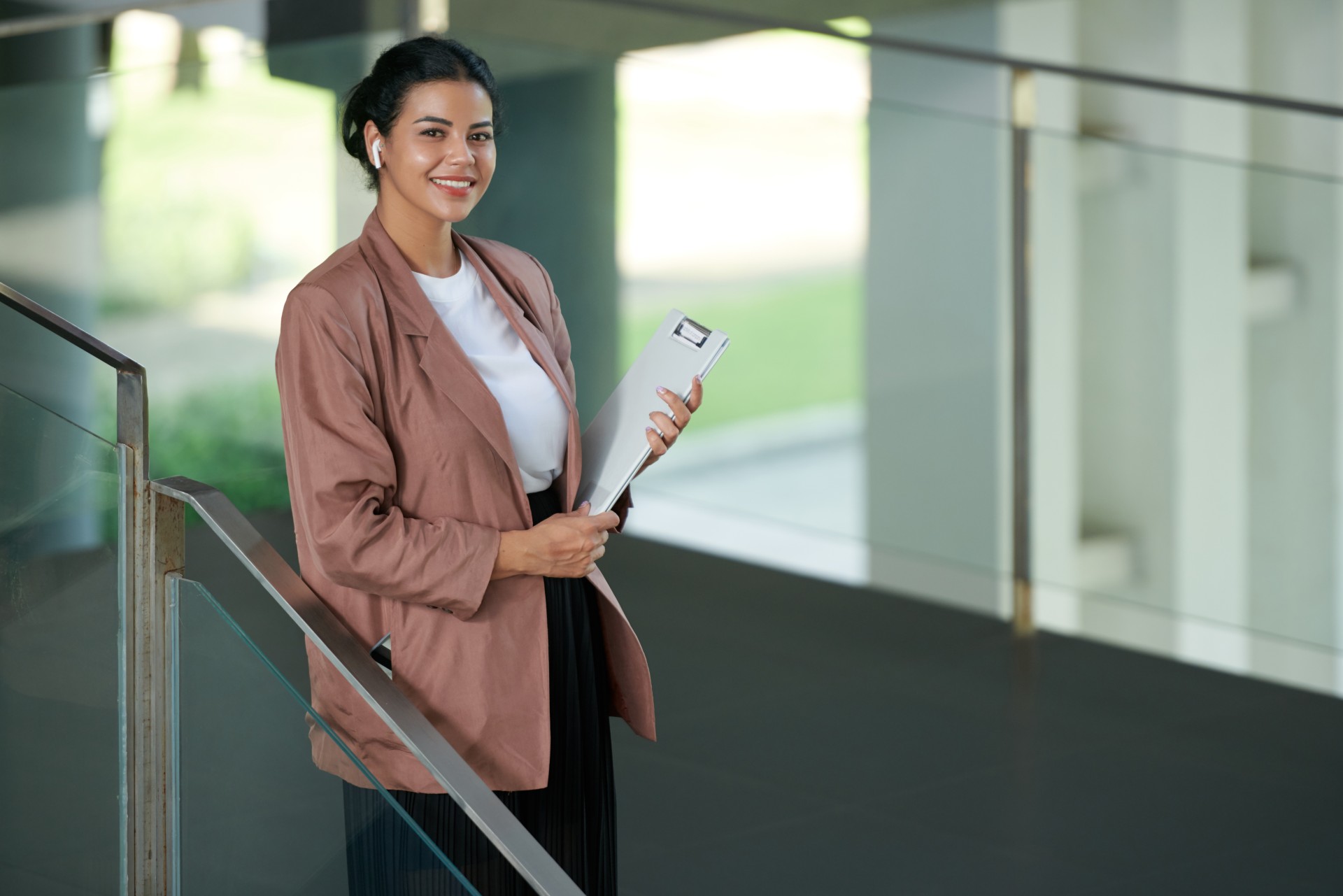 smiling-entrepreneur-with-clipboard-2025-01-29-12-50-25-utc (1)